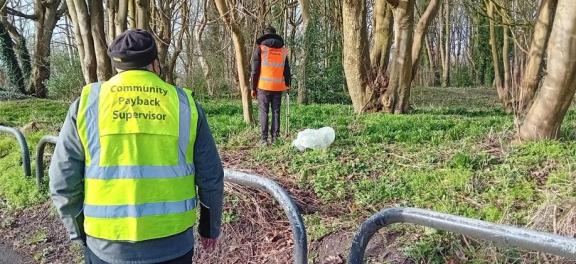 Picking up litter in Partington