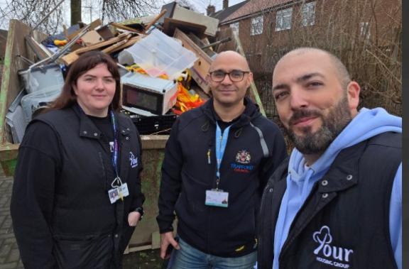 Staff taking part in a week of action to clear litter in Partington