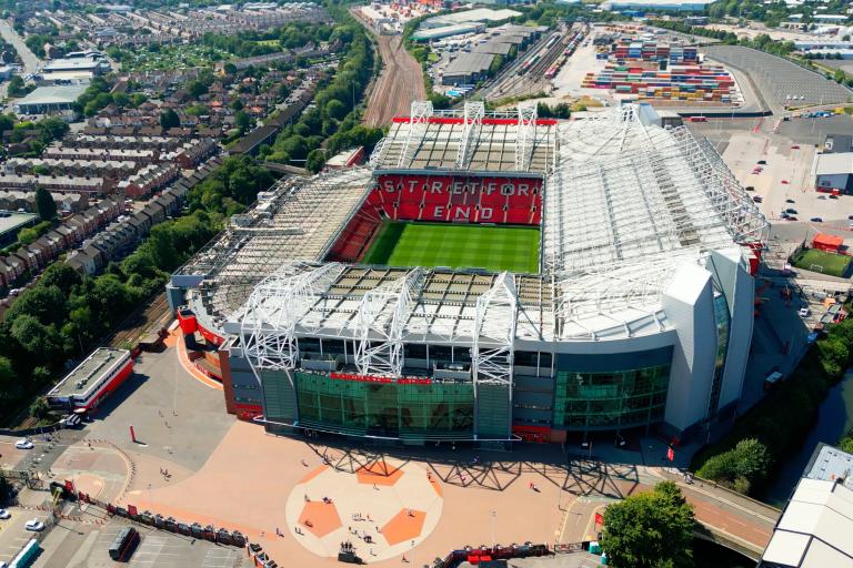 Aerial photo of Old Trafford stadium on a sunny day
