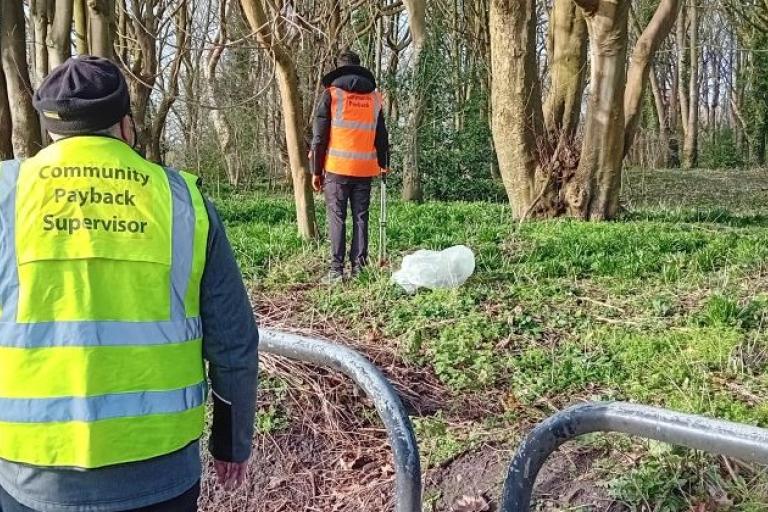 Picking up litter in Partington