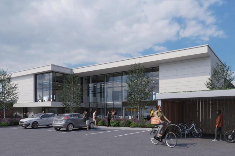 Architectural rendering of a modern two-storey building with a white exterior and large floor-to-ceiling glass windows.